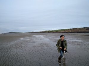 Ethan on the beach with Jaspa